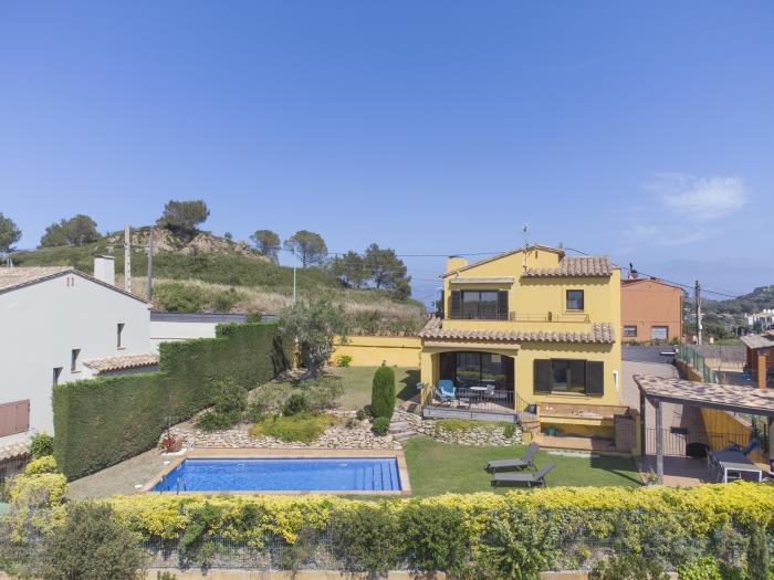 Tuin met privézwembad van Casa Amaya in Begur